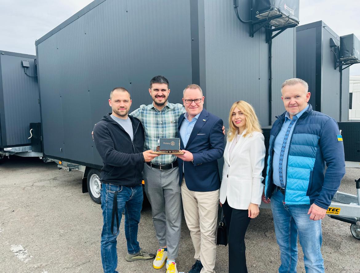 Lars Vestbjerg and Jakob Dalhoff, with project manager Iryna Melnyk and members of the project's team